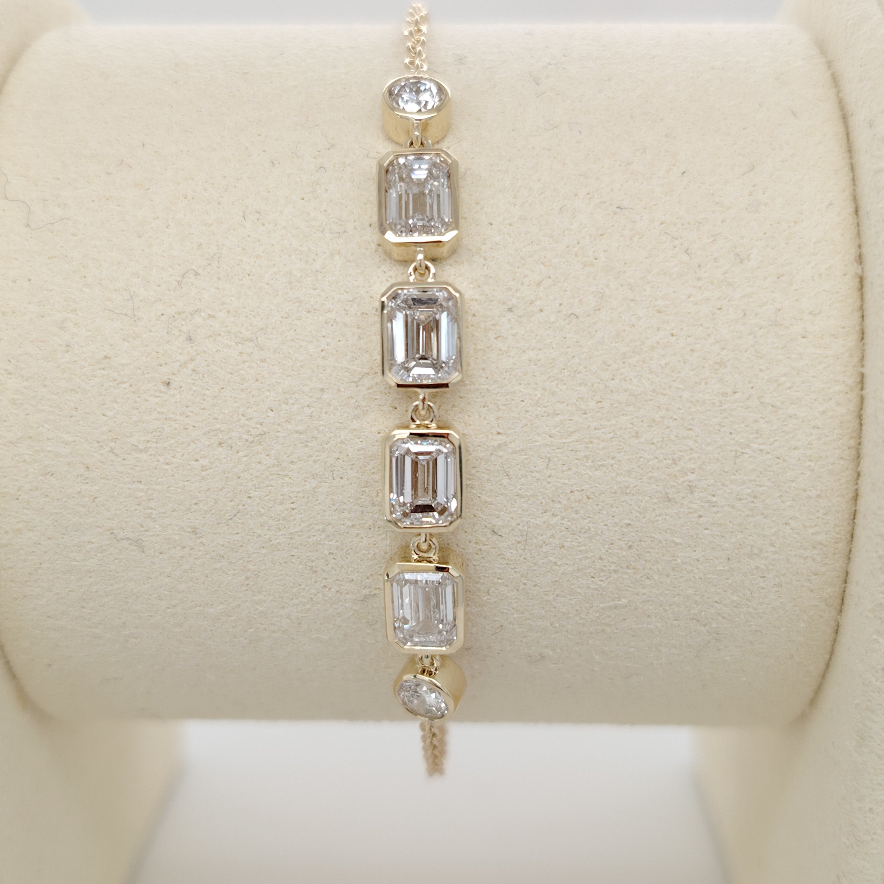 Bezel-Set Emerald Diamond Bracelet with Round Accents