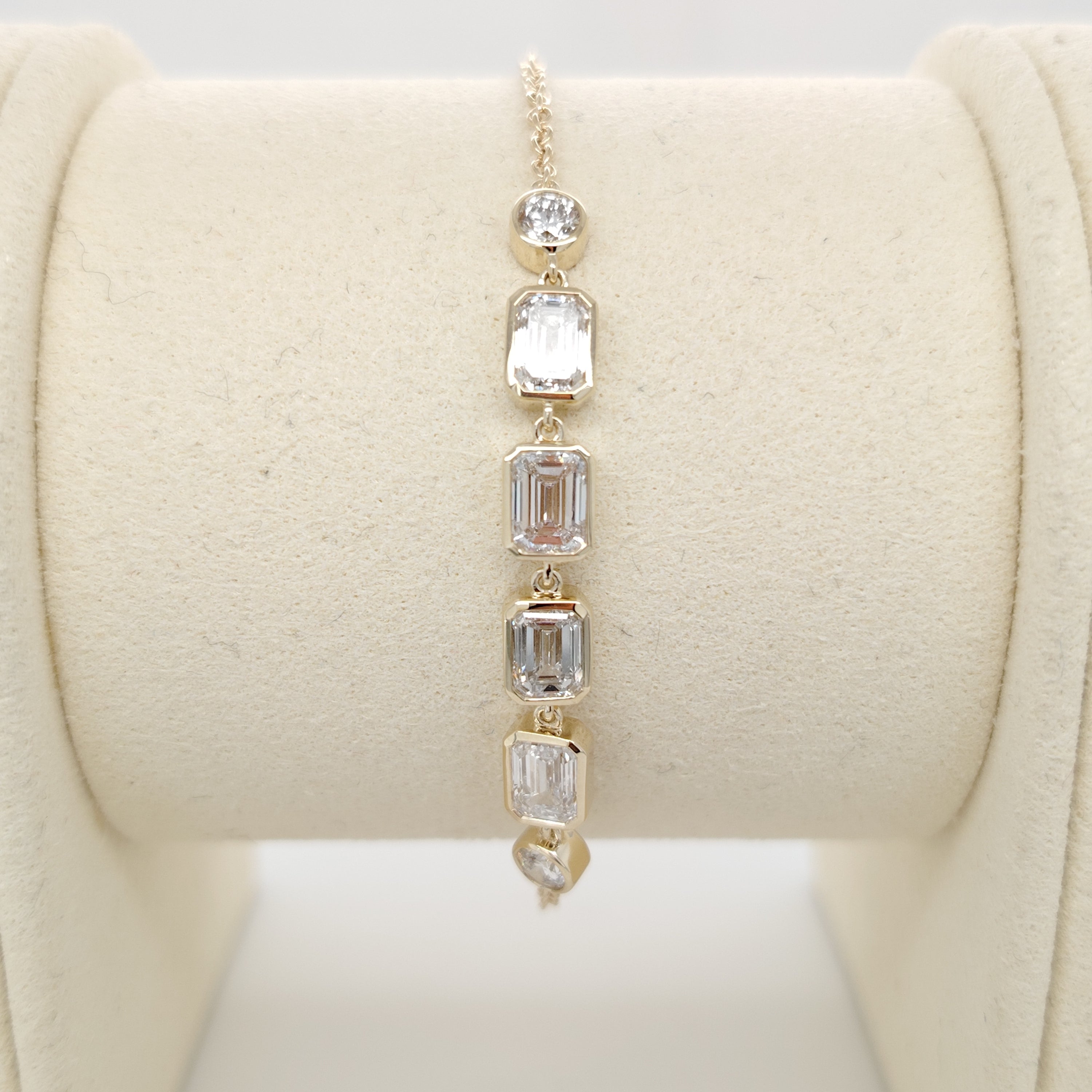 Bezel-Set Emerald Diamond Bracelet with Round Accents