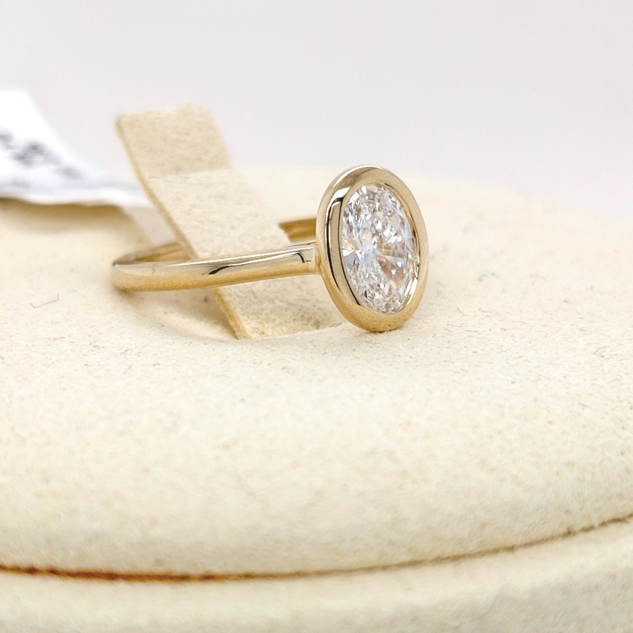 Oval Diamond Bezel Solitaire Ring