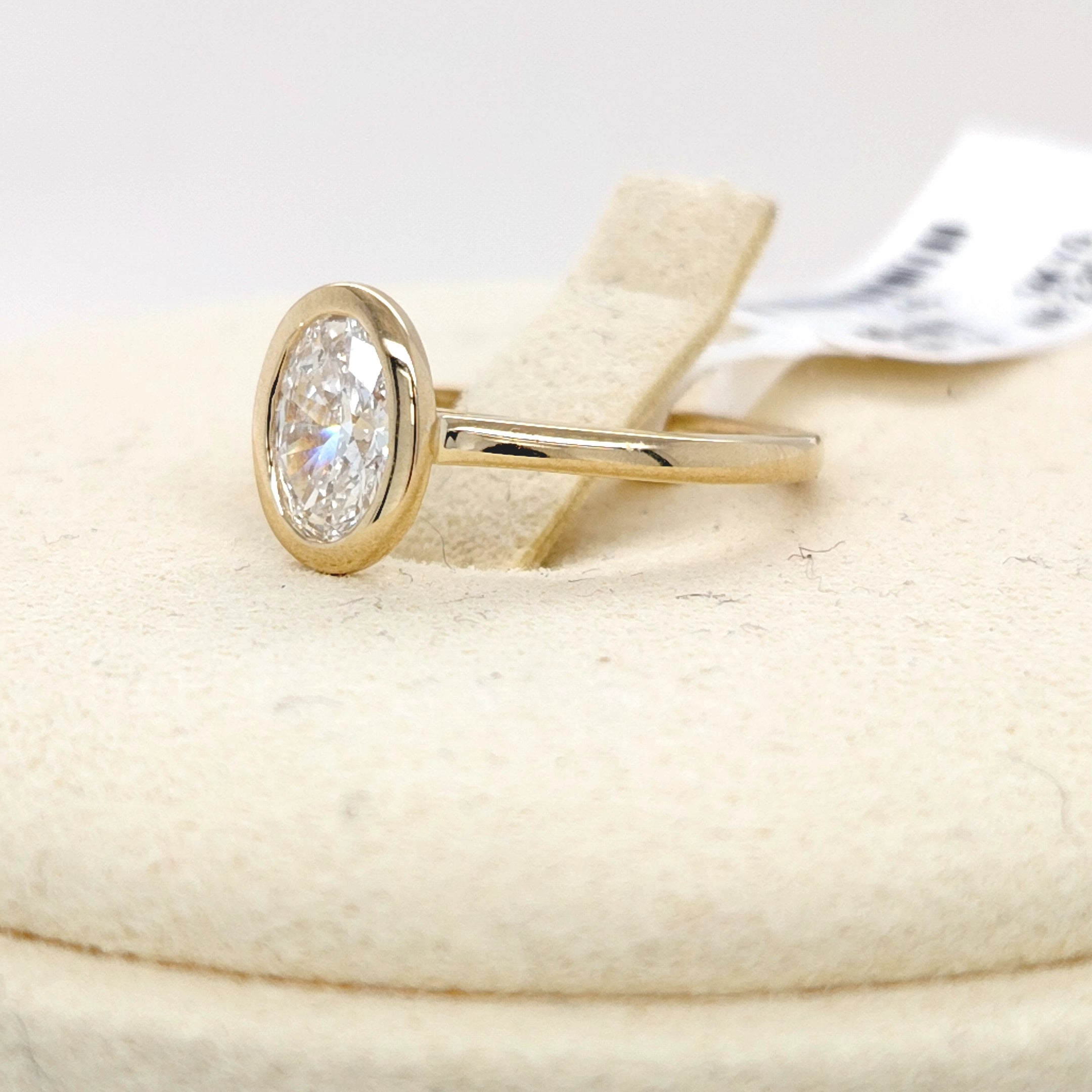 Oval Diamond Bezel Solitaire Ring