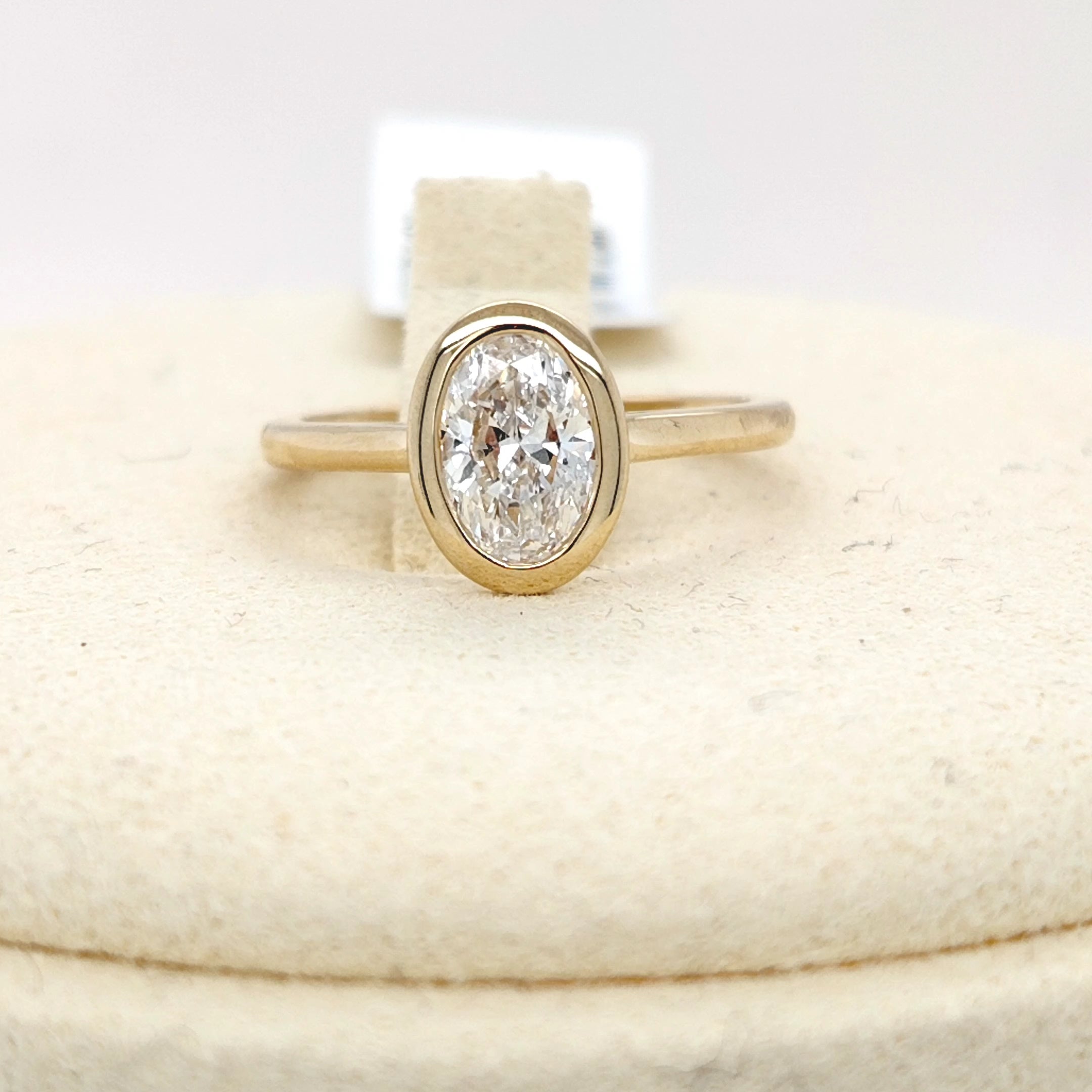 Oval Diamond Bezel Solitaire Ring