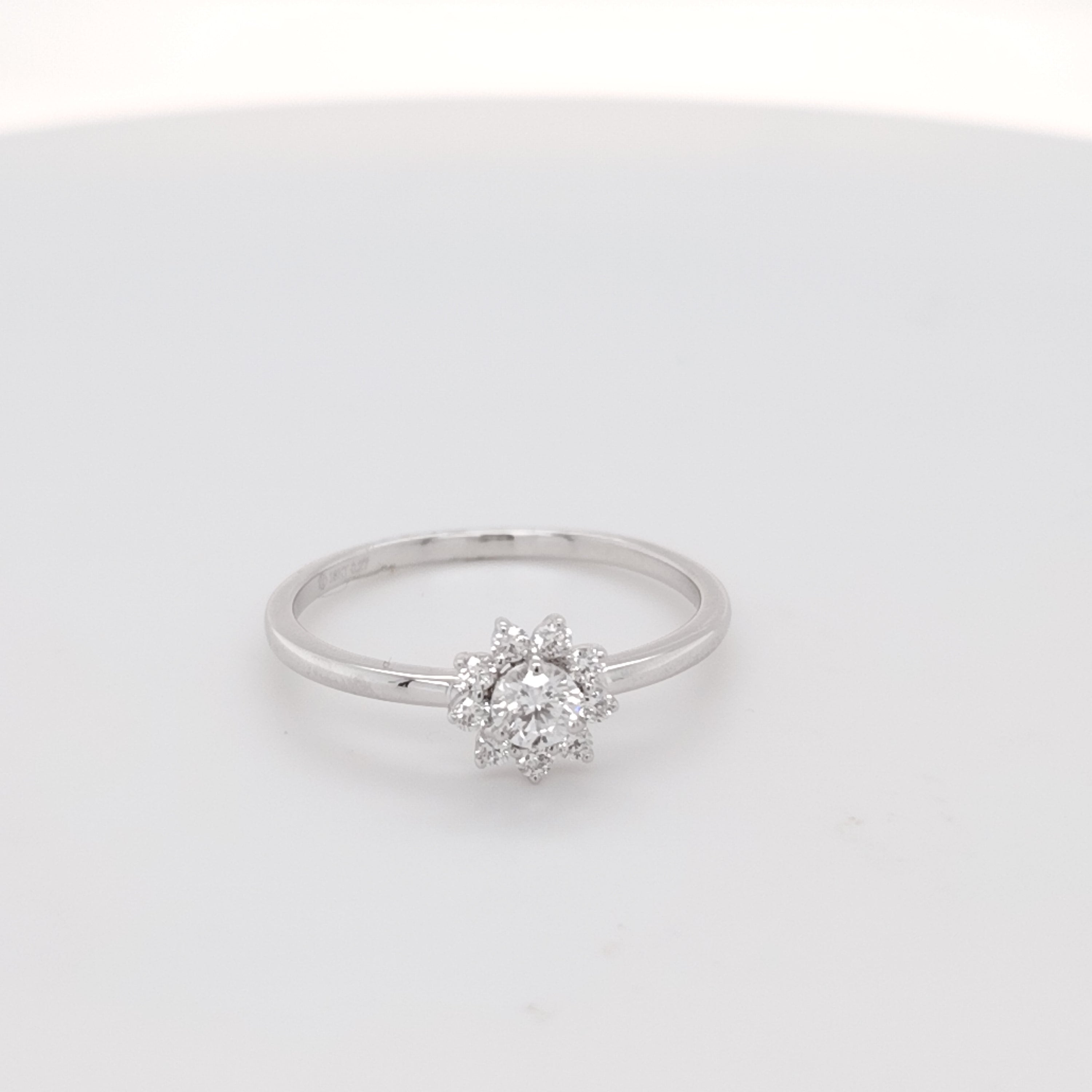 Floral Halo Diamond Solitaire Ring