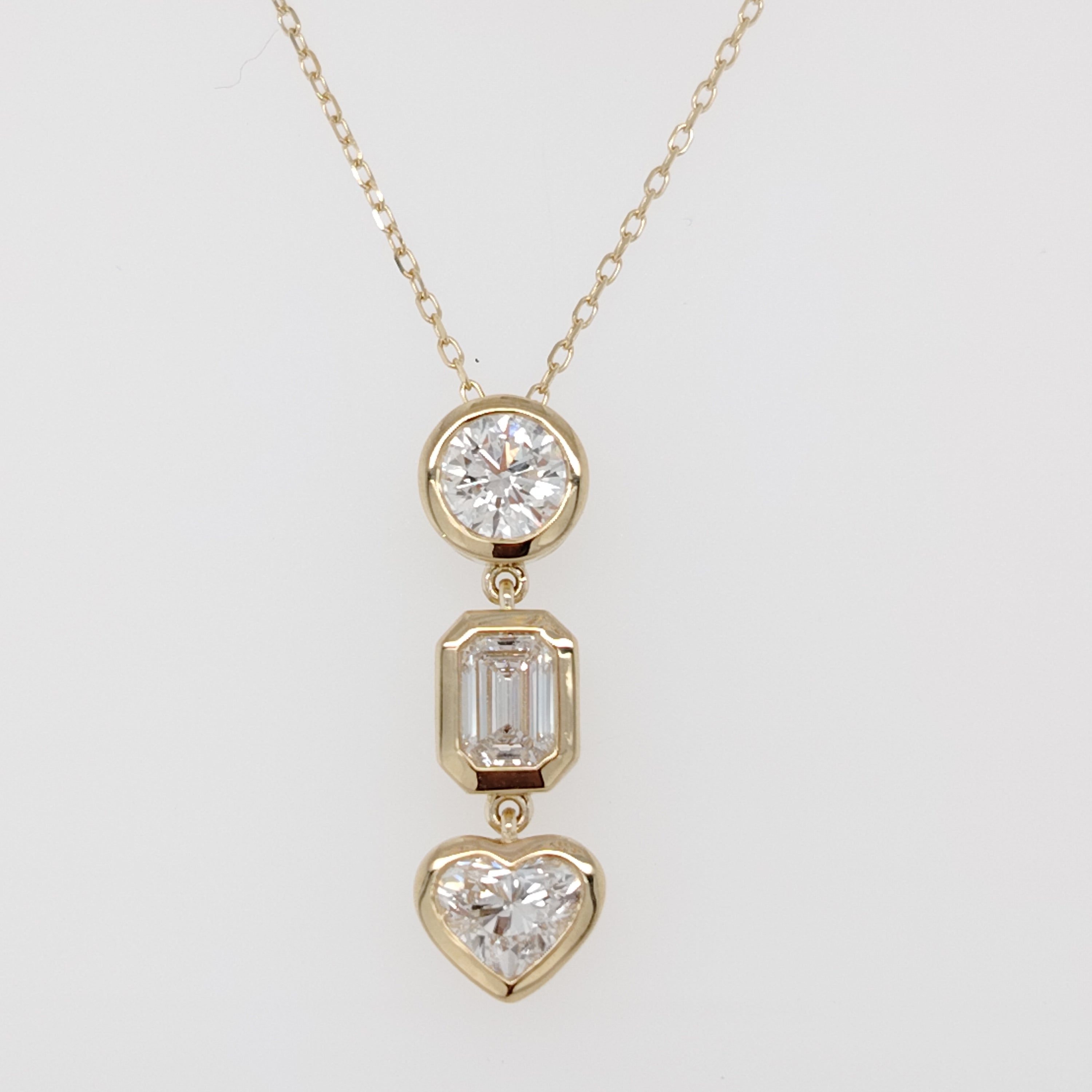 Celestial Trio Bezel Diamond Pendant