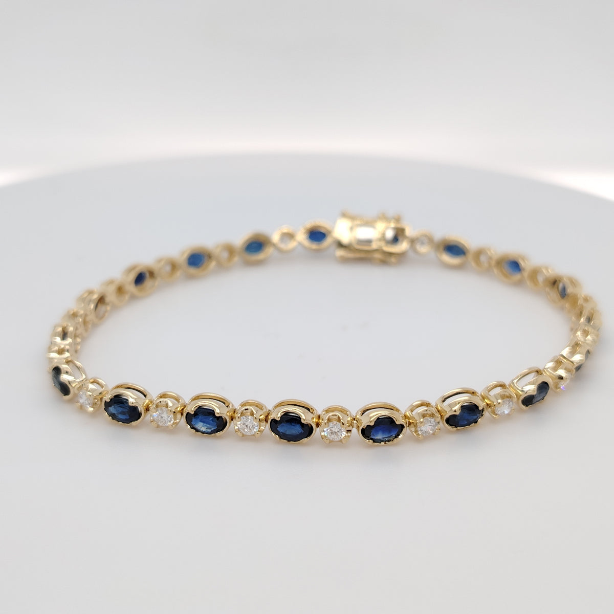 Oval Sapphire & Diamond Tennis Bracelet in 18K Yellow Gold