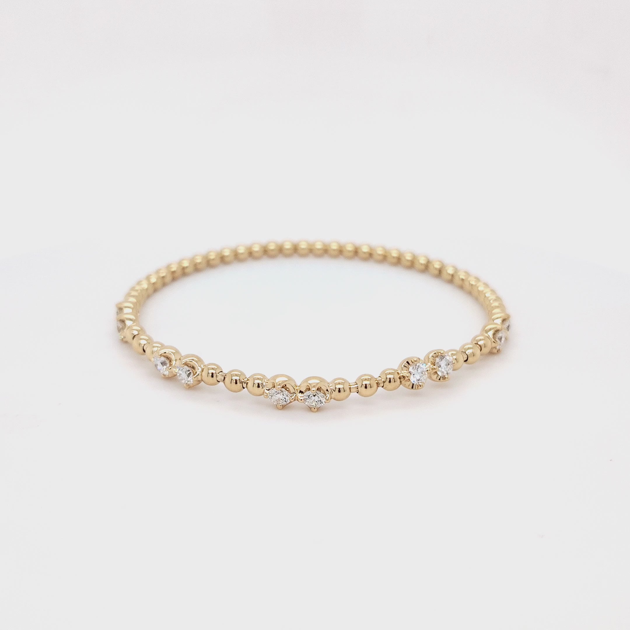 Gold Bead Stretch Bracelet with Diamond Accents