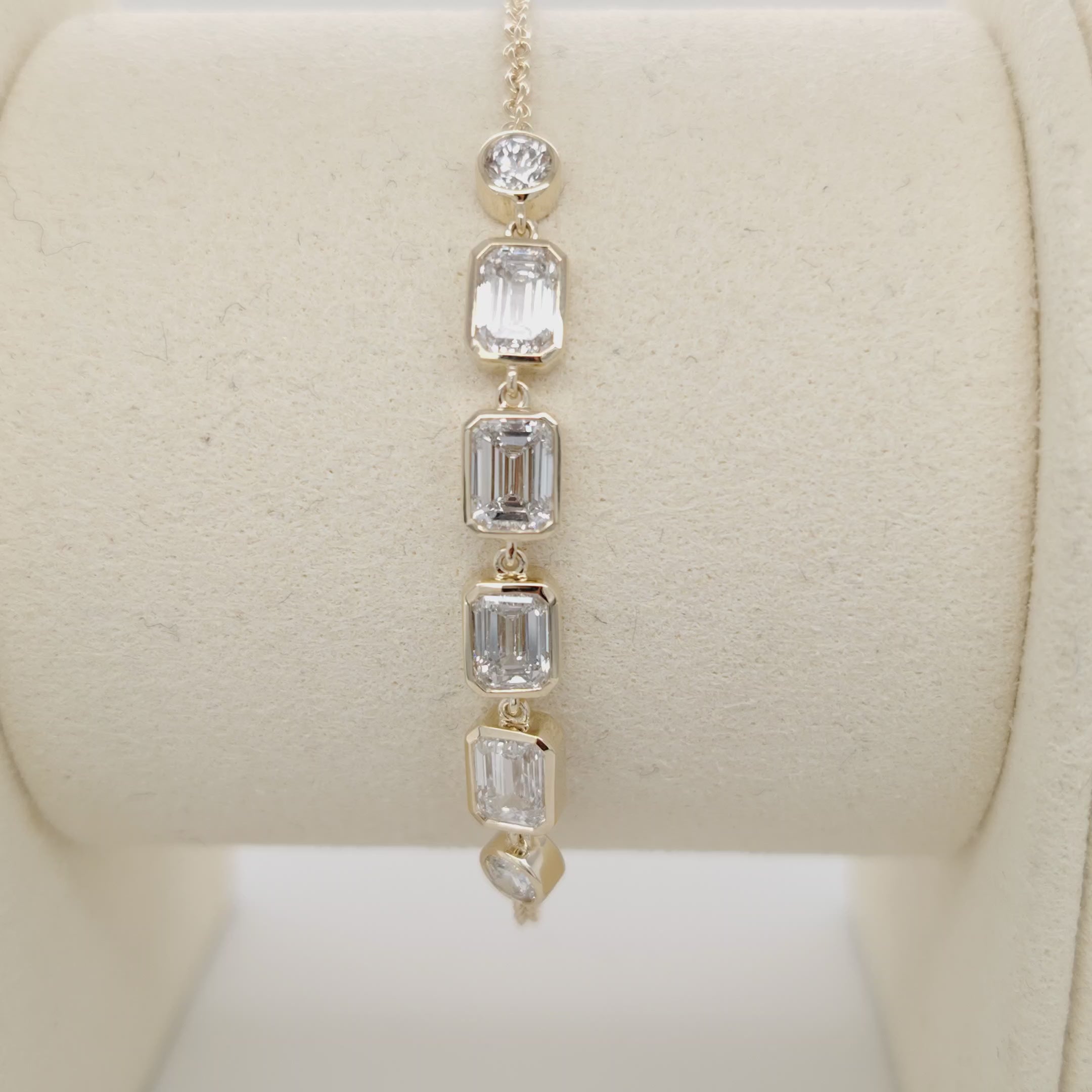 Bezel-Set Emerald Diamond Bracelet with Round Accents