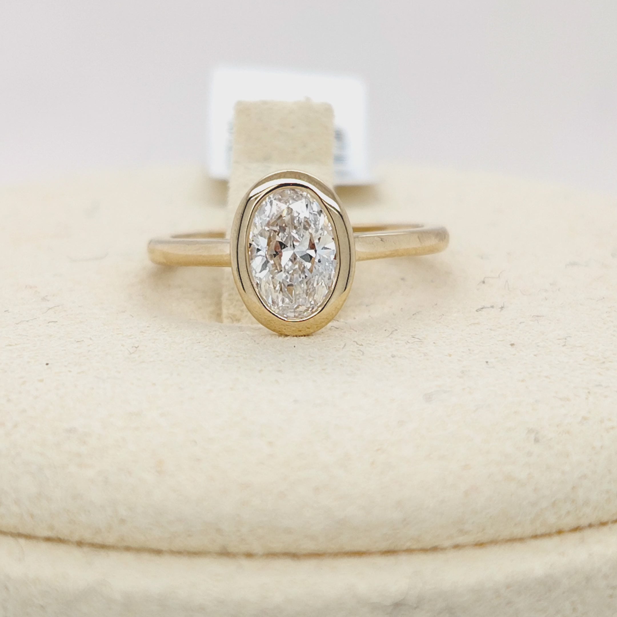 Oval Diamond Bezel Solitaire Ring